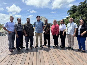 posing with Pacific Indemnity Officials and Staff July 23, 2024